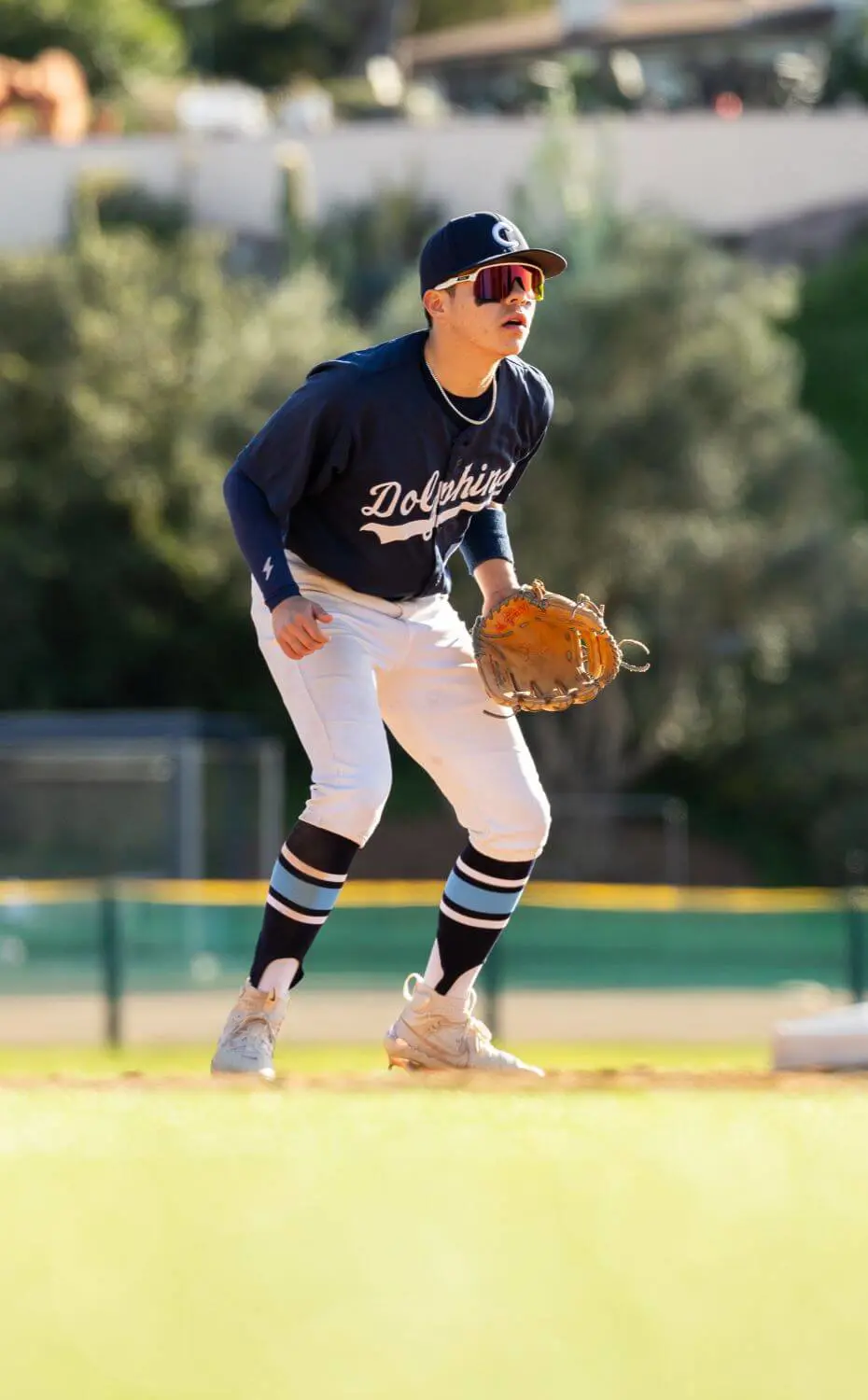 Chadwick Baseball team member on the field with baseball glove.