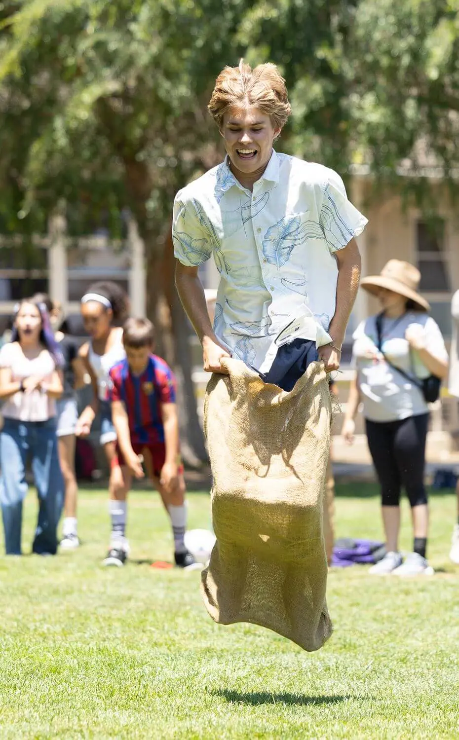 Child taking part in a relay race during a Chadwick Summer Program.