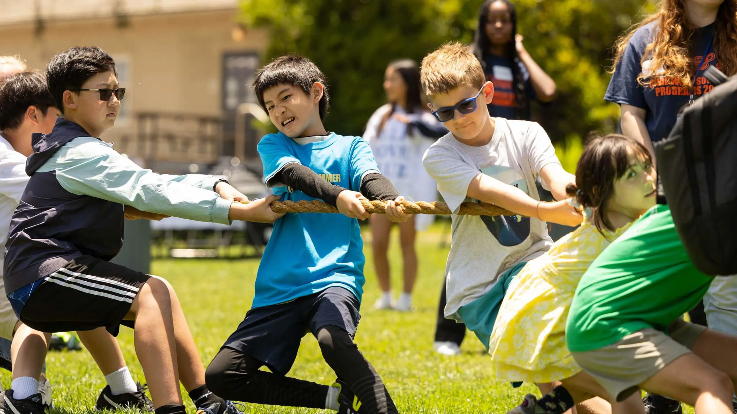 Children attending a Summer Program at Chadwick School playing Tug of War.