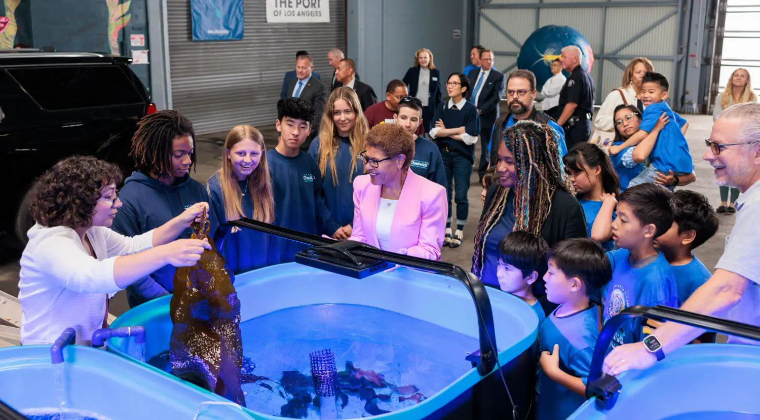 Students touring the KELP ArK with outreach and partnership associate Hayden Schneider, and make algae presses as part of their training to become Ocean Ambassadors.