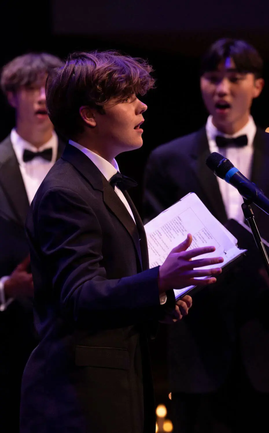 Upper School students singing in the 7-12 Winter Vocal Music Concert