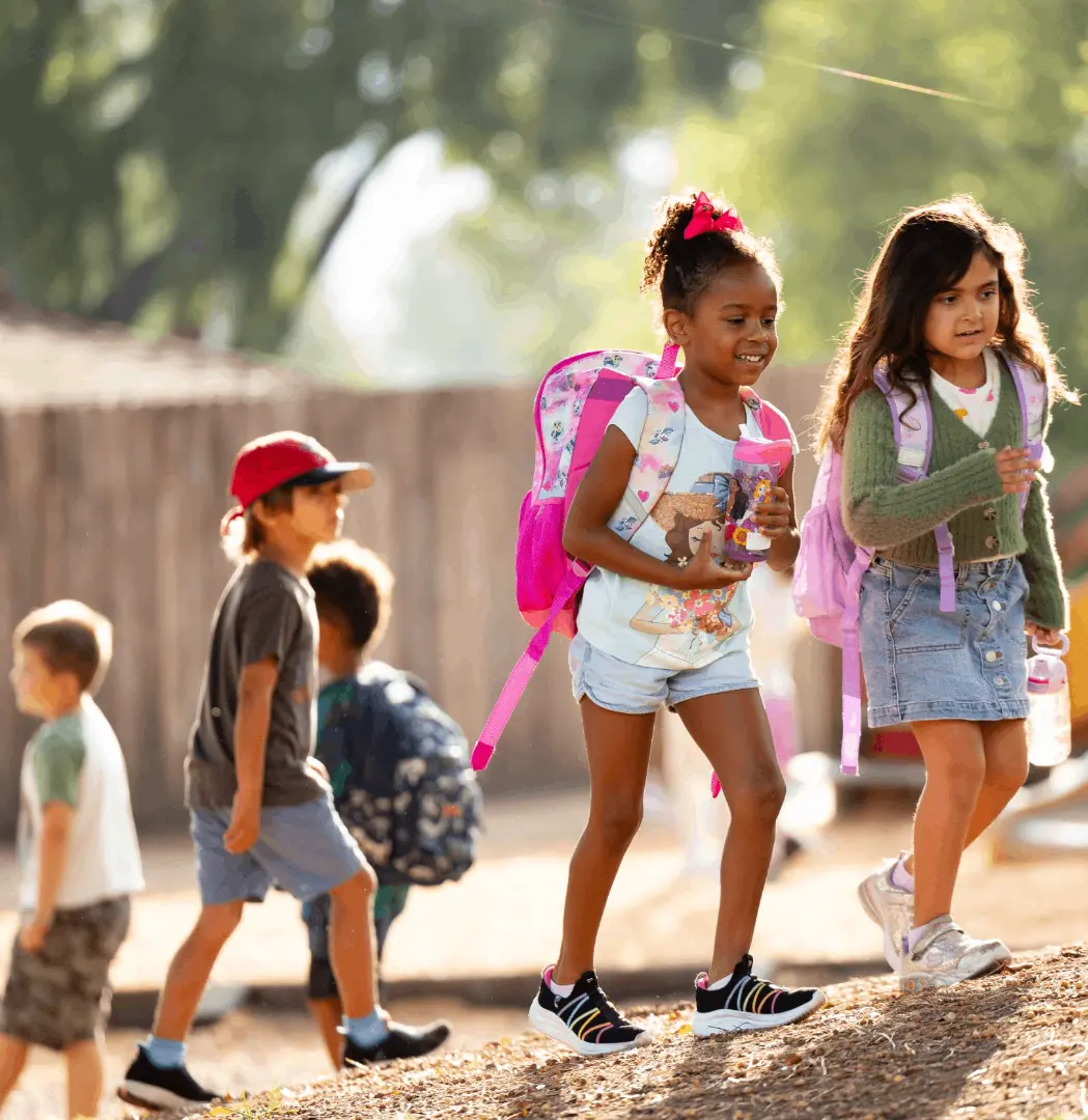 Village students arrive for class.