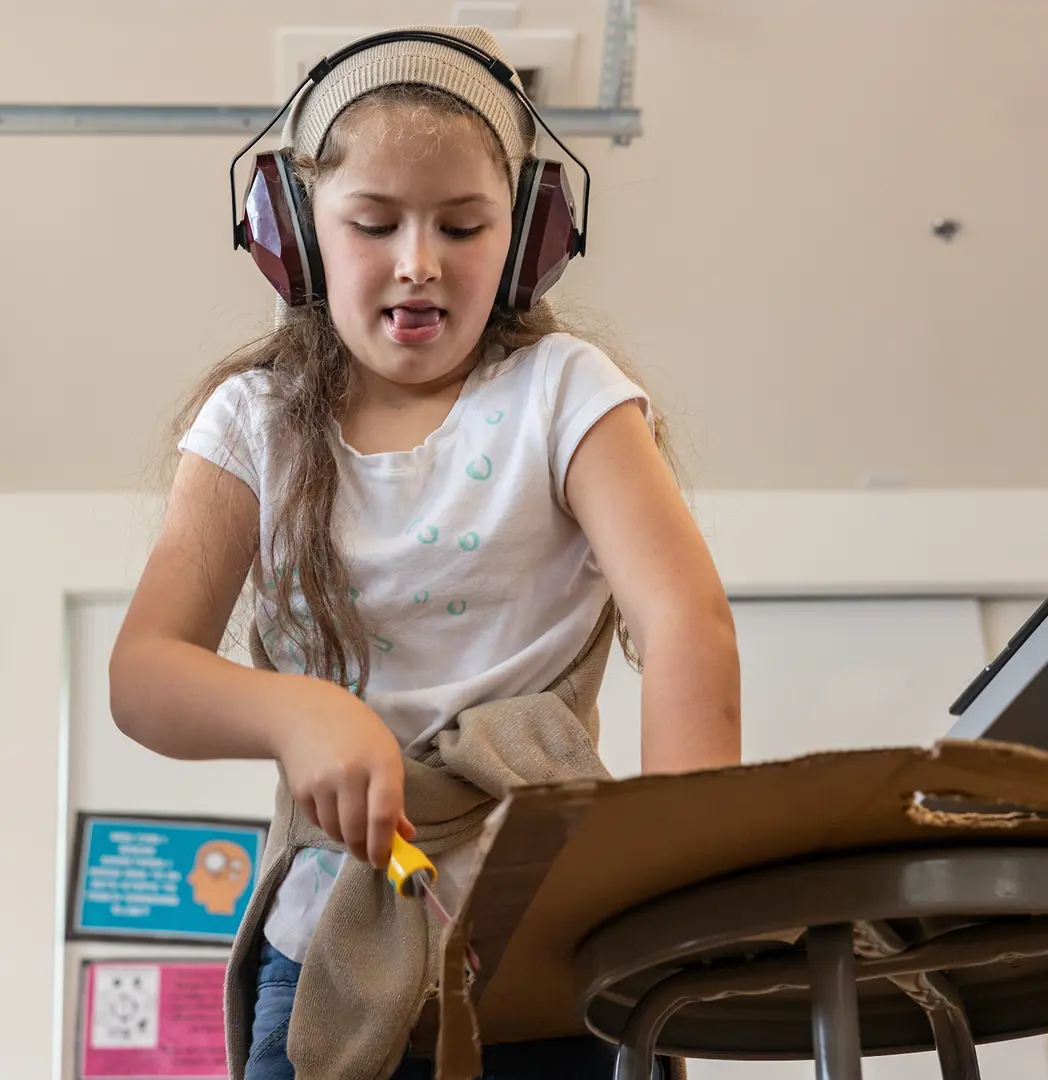 Student in music class